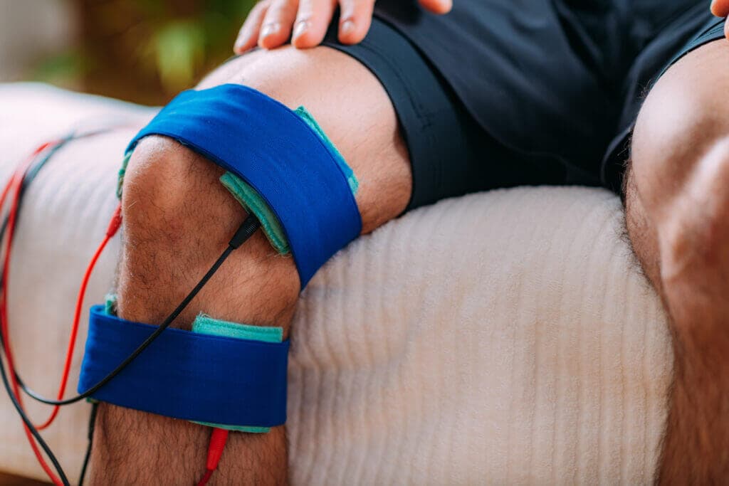 A close up on a person's knee showing a brace